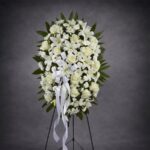 Pure Elegance Tribute Standing Spray with White Ribbon